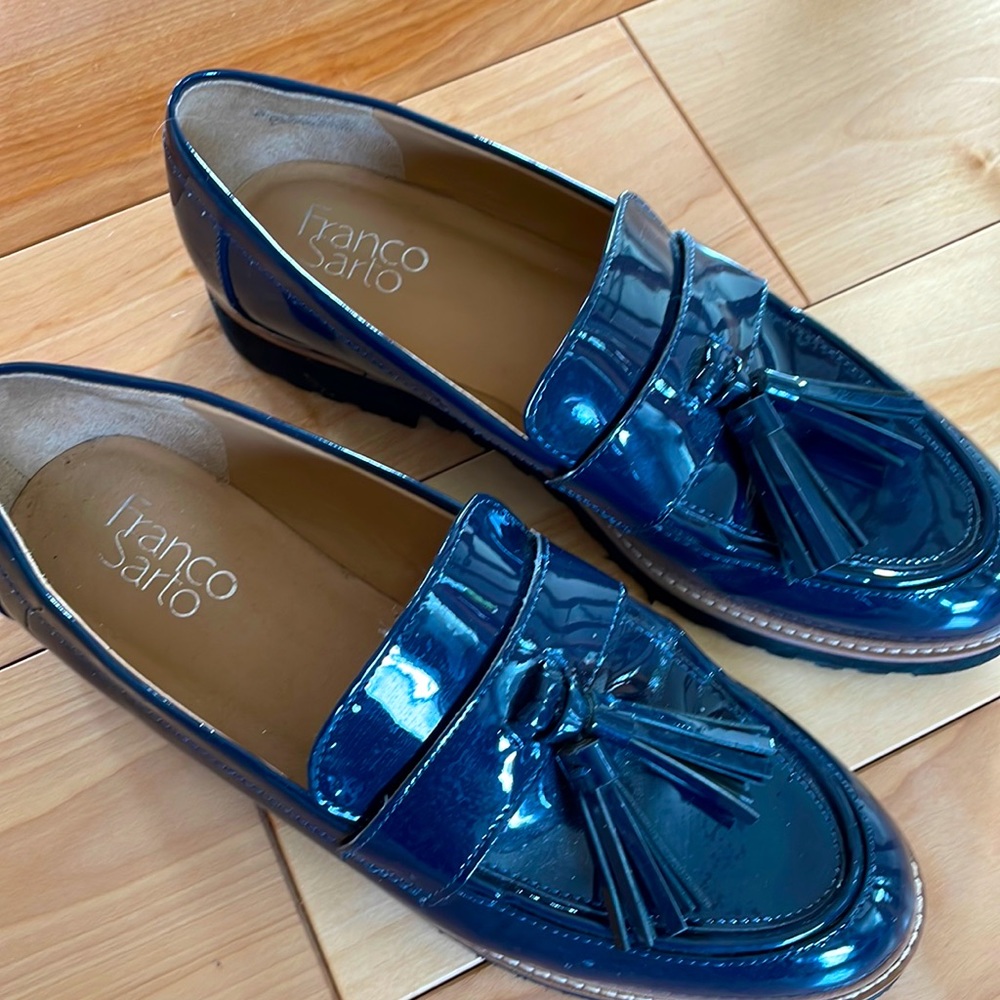 Navy blue “patent leather “ type  loafer with tassels, man made material, size 8